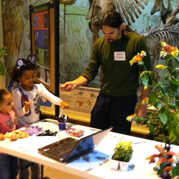 Nathan explains how plants often depend on bats, birds or insects to pollinate their flowers.Sunday with a Scientist at the State Museum, April 17, 2011