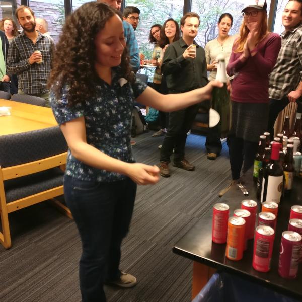 Julia popping the champagne after her exit talk, 2017