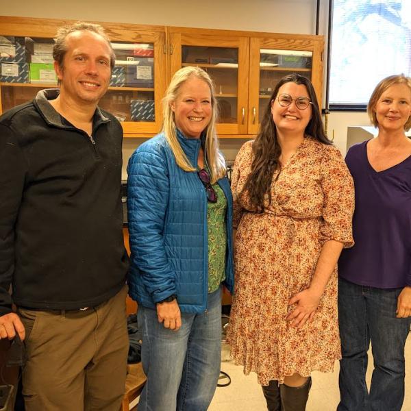Celebrating Chelsea's defense with her committee, Fall 2022