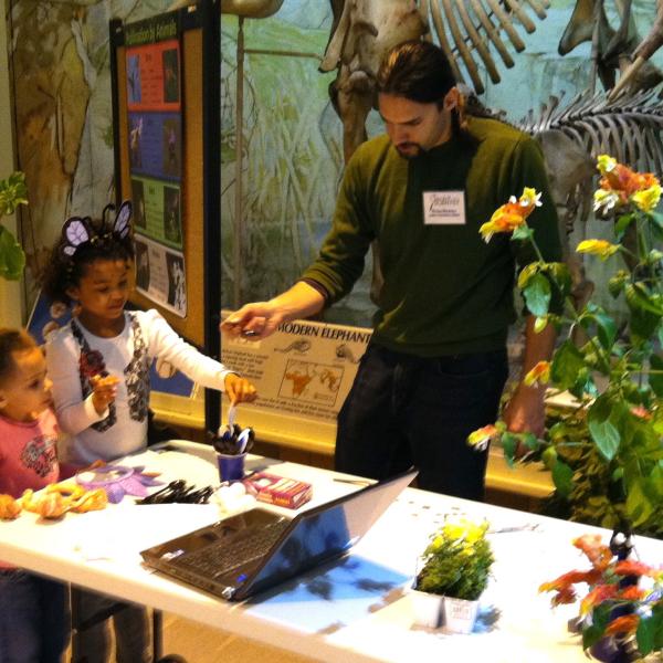 Nathan explains how plants often depend on bats, birds or insects to pollinate their flowers.Sunday with a Scientist at the State Museum, April 17, 2011