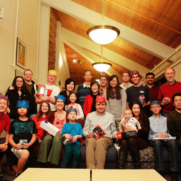 a group photo on the top of the Gamow tower during a holiday party in winter 2013