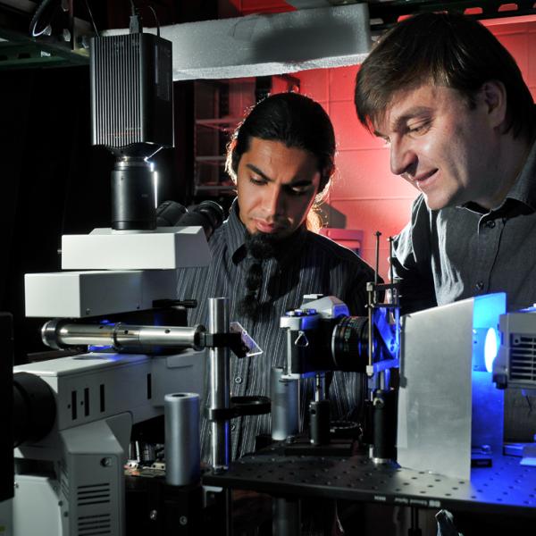 Ivan Smalyukh and Angel Martinez working in the lab in 2009