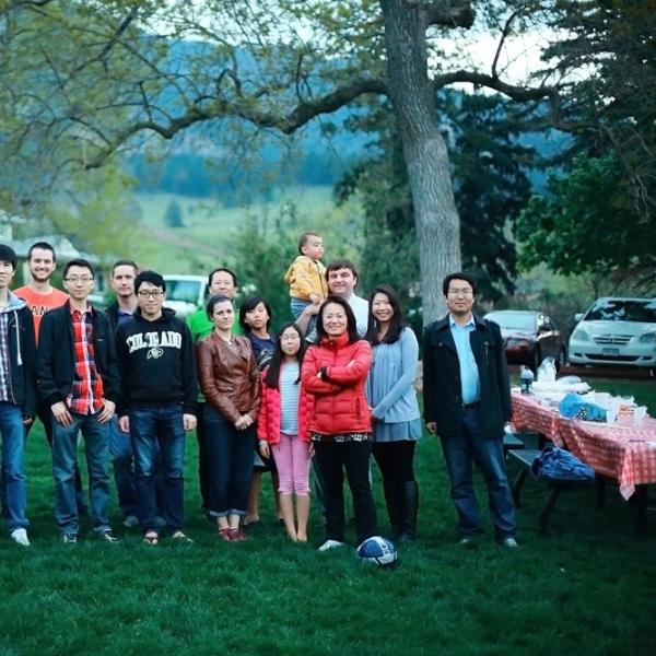 members are happy at a group BBQ in spring 2015
