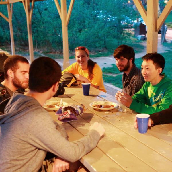 members socializing during a group hike in spring 2016