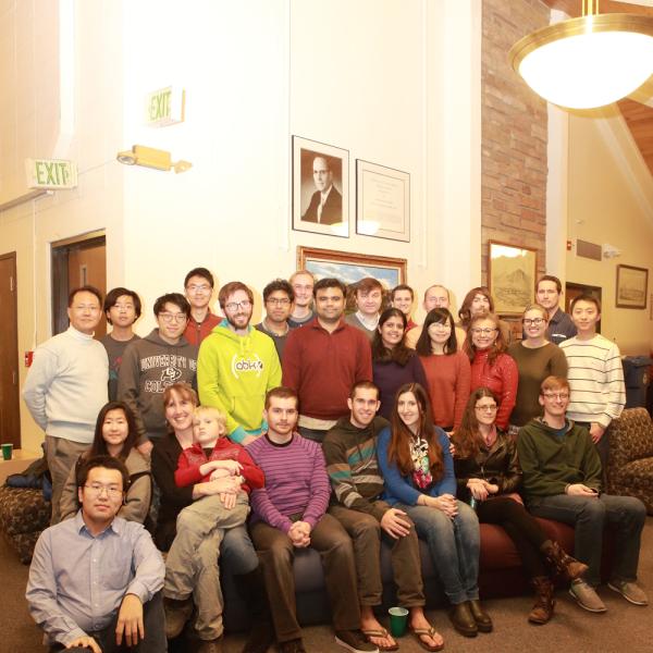 a group photo at a holidays party in december of 2016
