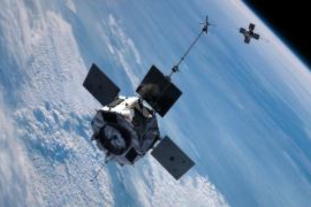 Satellite above Earth with clouds