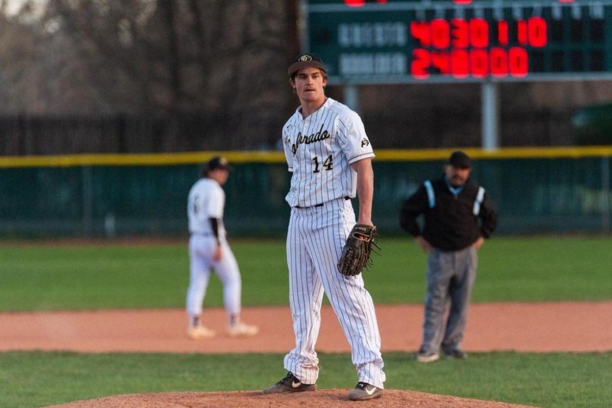 CU Student playing baseball