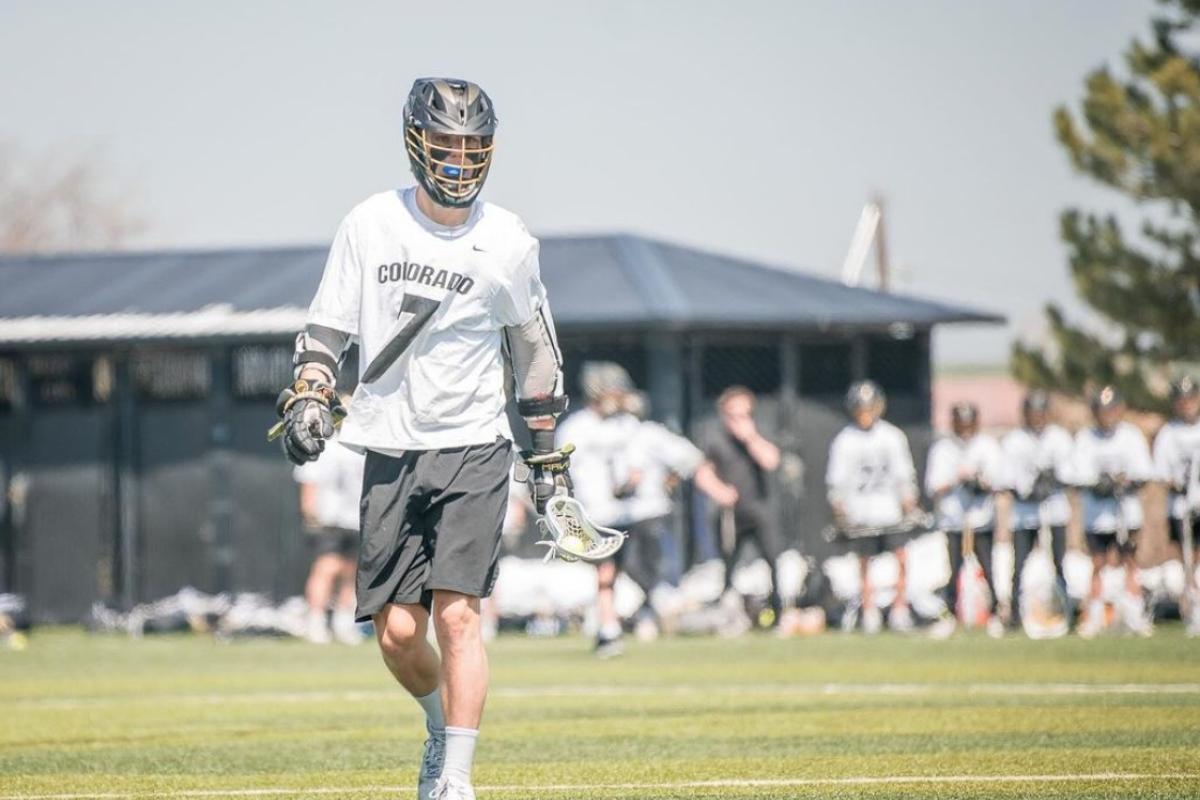 CU Student playing lacrosse