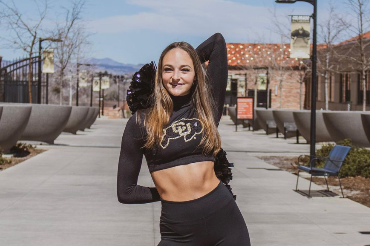 CU Dancer posing on campus