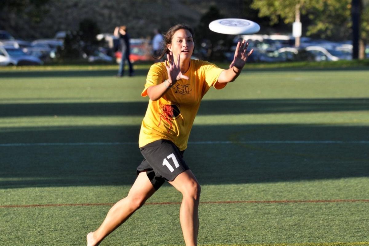 CU Ultimate player catching a frisbee