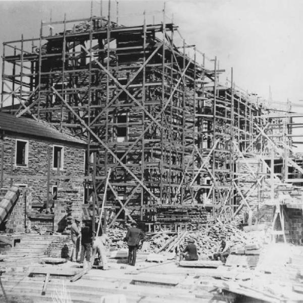 Photo of Sewall Hall under construction