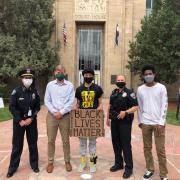 CUPD Chief Doreen Jokerst (second from right) is pictured taking part in a Black Lives Matter march in downtown Boulder last summer. Also pictured left to right are Boulder Police Chief Maris Herold; Boulder District Attorney Michael Dougherty; student organizer Kennedy Blackwell; Chief Jokerst; and student Jemil Kassahun. (courtesy photo)