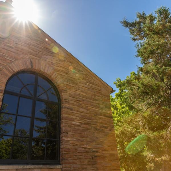 Exterior Shot of CU Building with sun shining