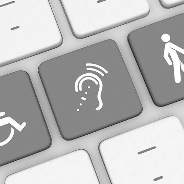 Keyboard with keys for wheelchair, assisted listening device, blind person icon