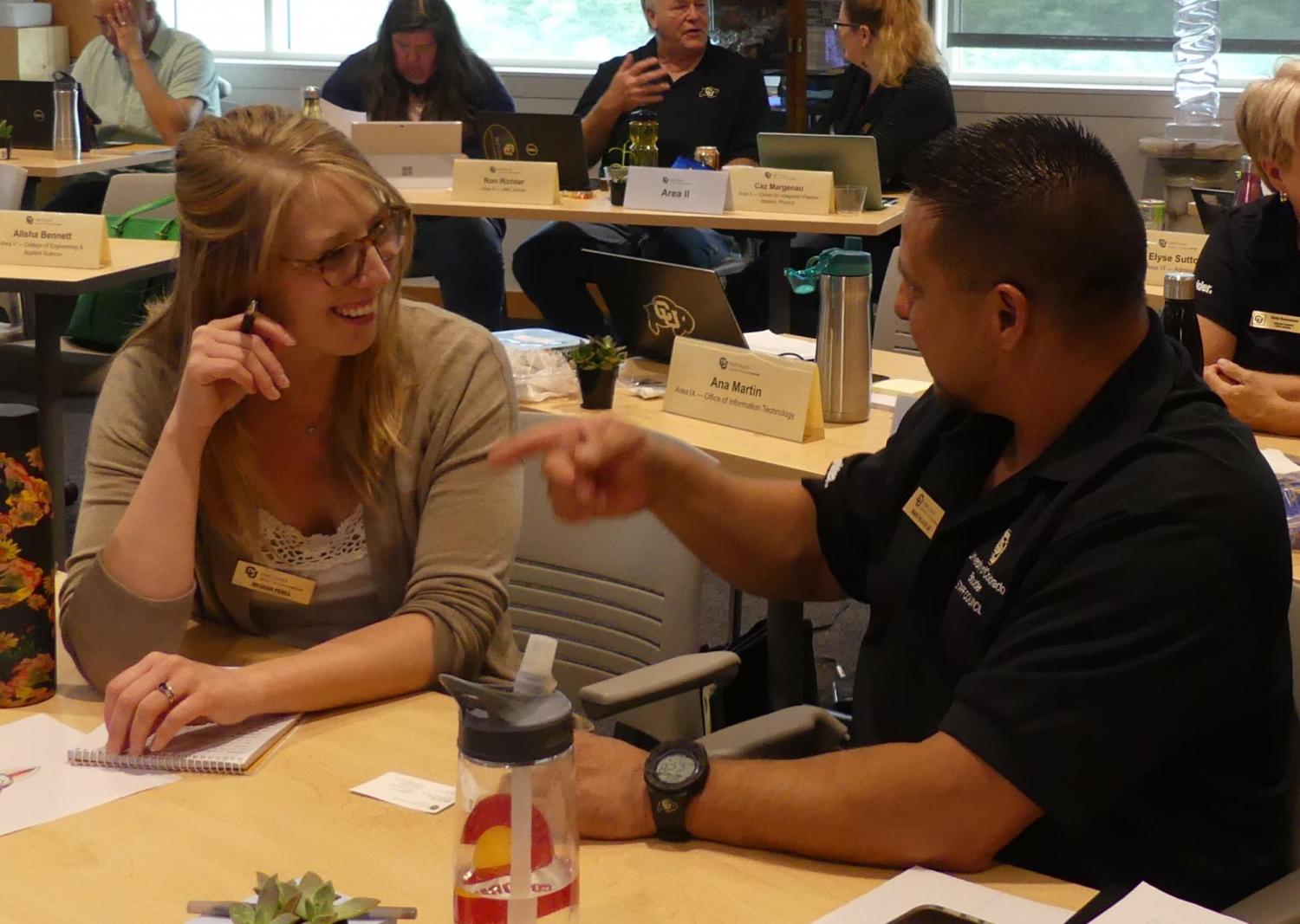 Two staff council members speaking