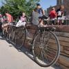 Bicycles leaning against a brick wall