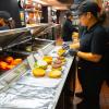 Dining staff serving food