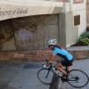 Woman riding bicycle on campus