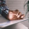 Person holding an tablet