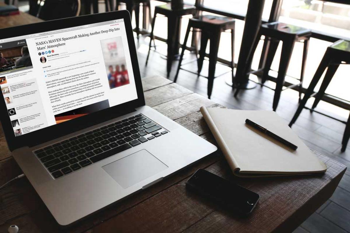 CU Boulder news story on a laptop screen