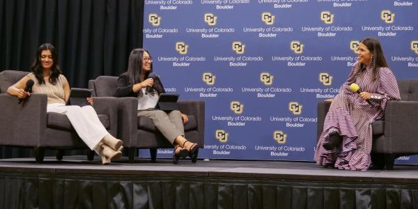 America Ferrera chats with two CU Boulder students at a speaker event on campus