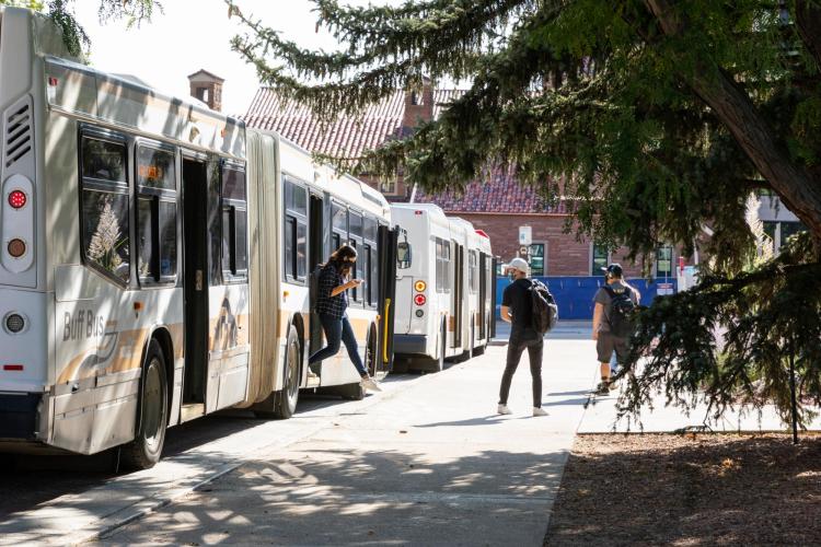 students getting off the Buff Bus