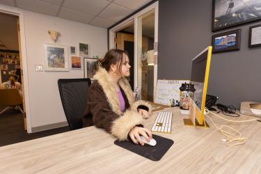 student working at computer