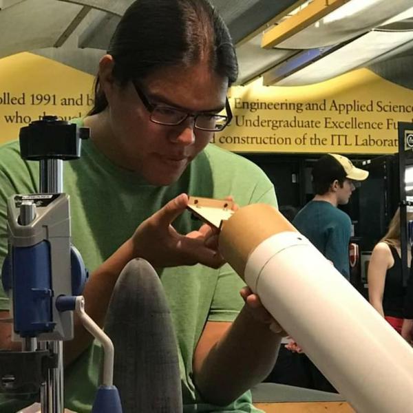 Aaron Ashley working on his team's FNL rocket