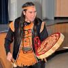 Alaska Native Bill Pagaran playing a hand drum