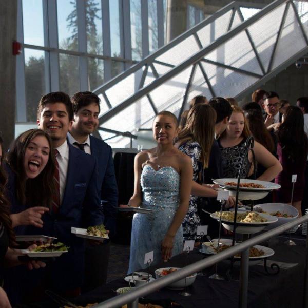 Students waiting in line to get food