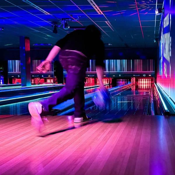 Member of Titans Productions bowling.