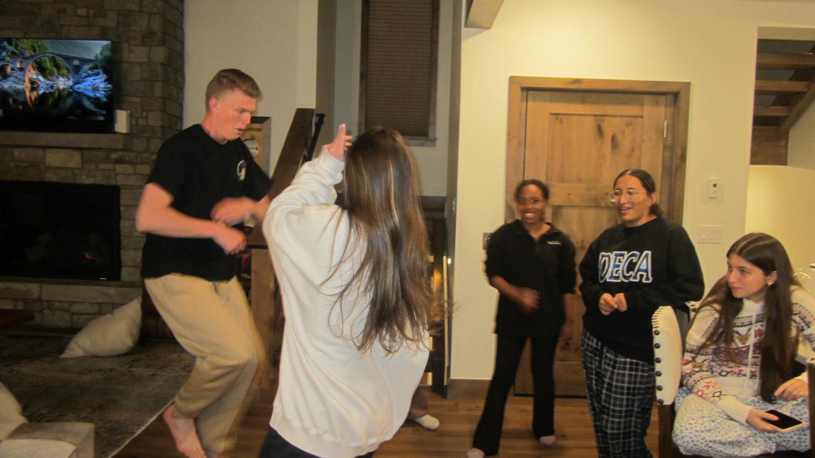 Members dancing.