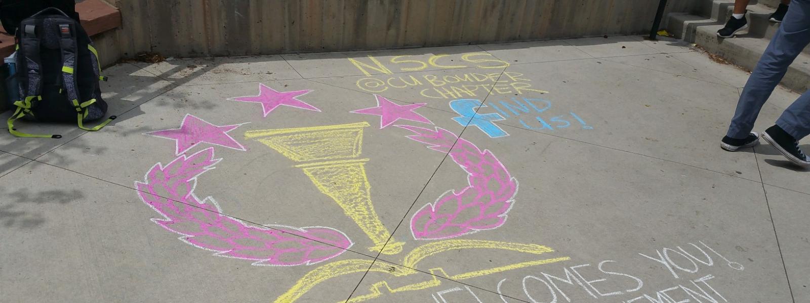 chalking near umc for student fair 2016