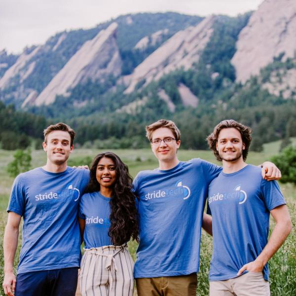 StrideTech team in front of Boulder flatirons