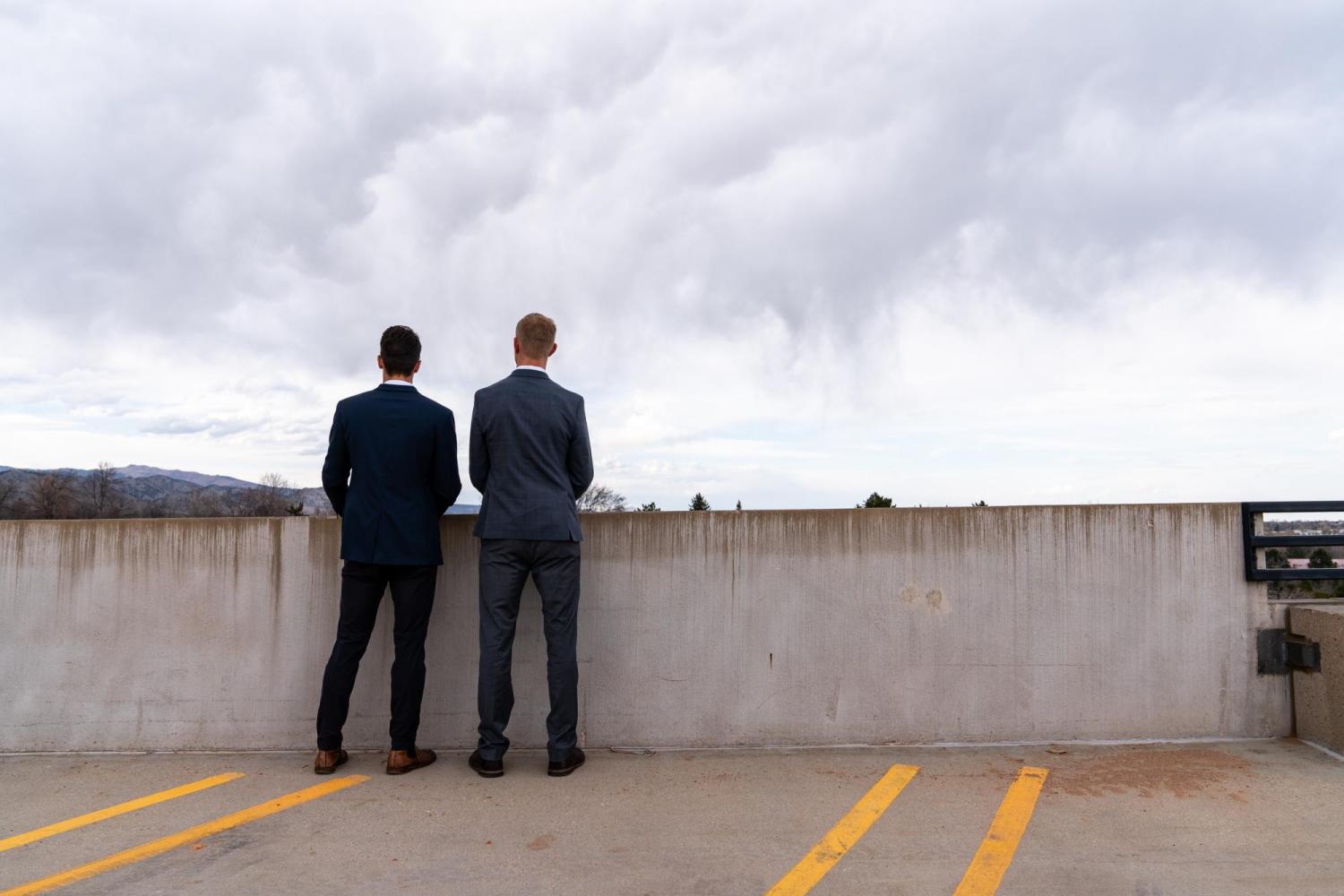 Tyler Calge and Reese Barracks standing in parking lot