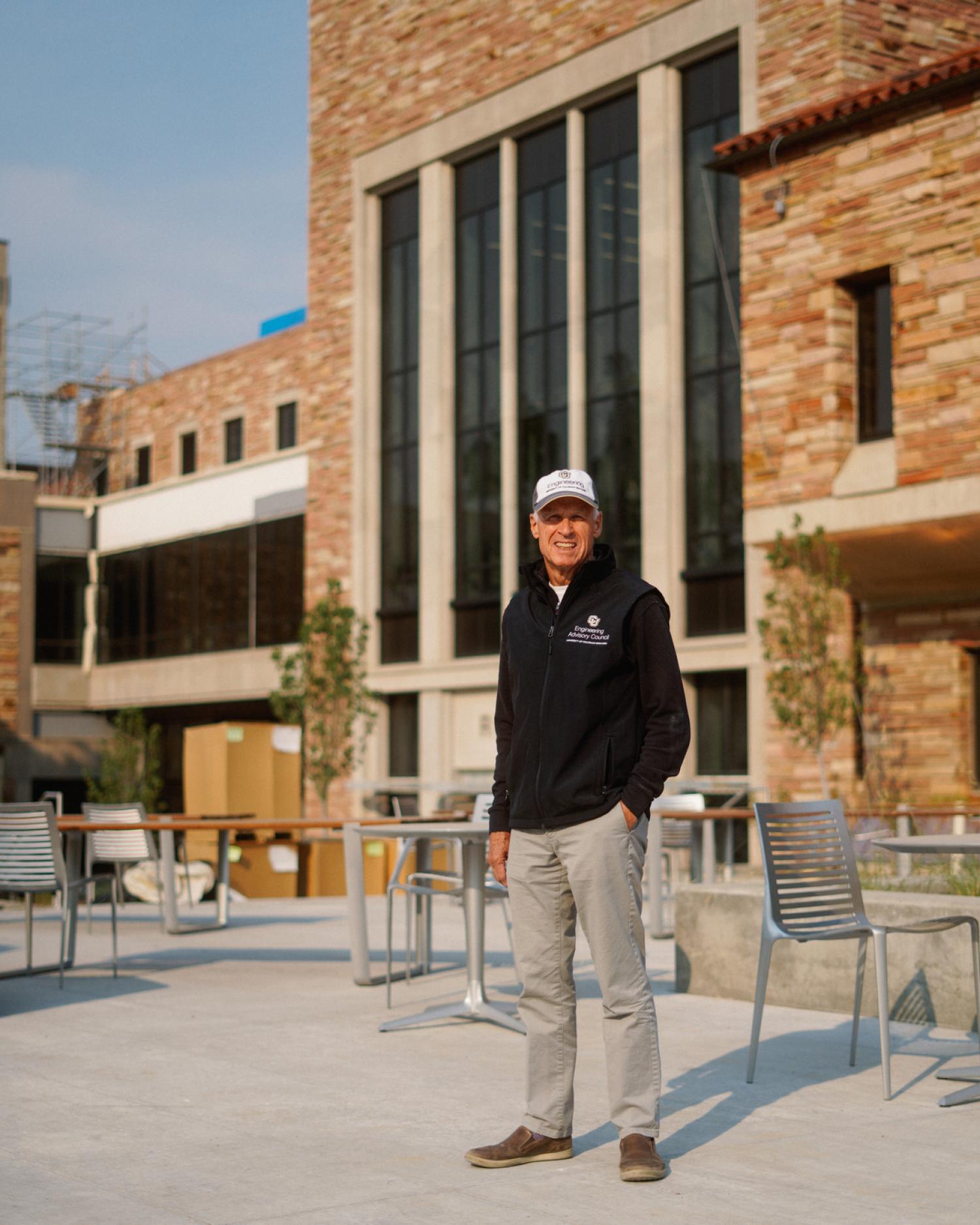 Associate Dean Doug Smith standing in front of the expansion. He is smiling.