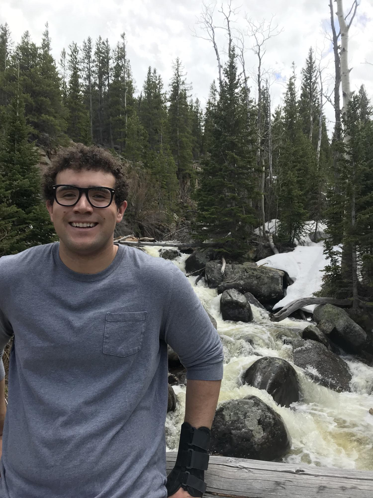 Isaiah Jones standing in front of river