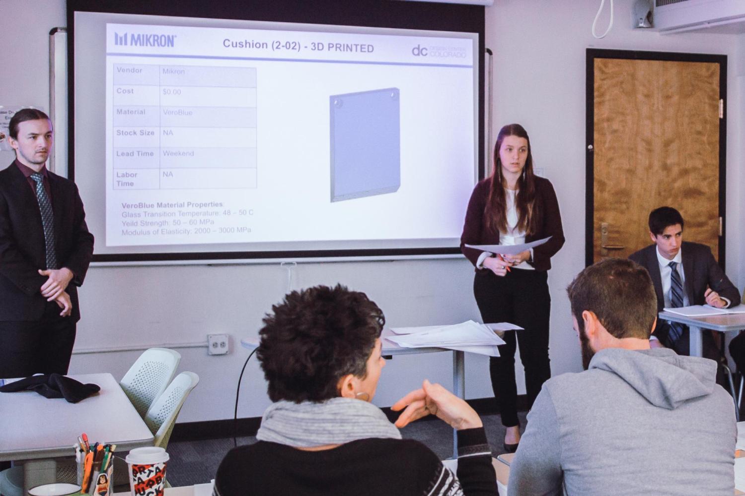 Two students present senior design project to panel