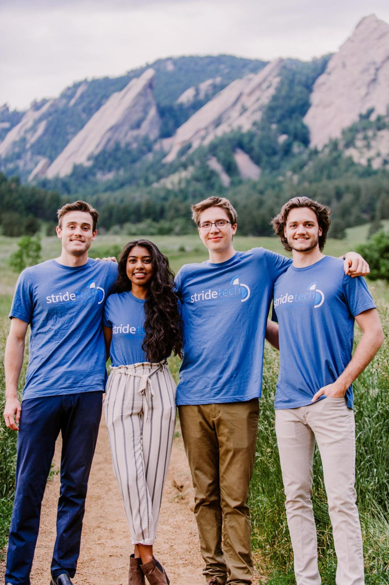 StrideTech team in front of Boulder flatirons