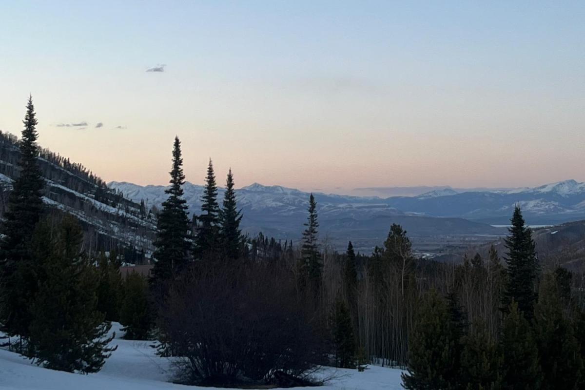 a mountain view at dusk