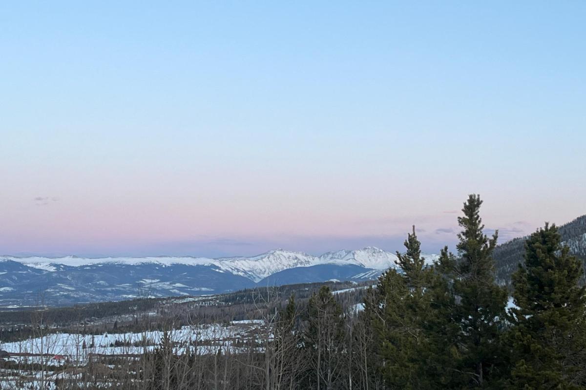 a mountain view at dusk