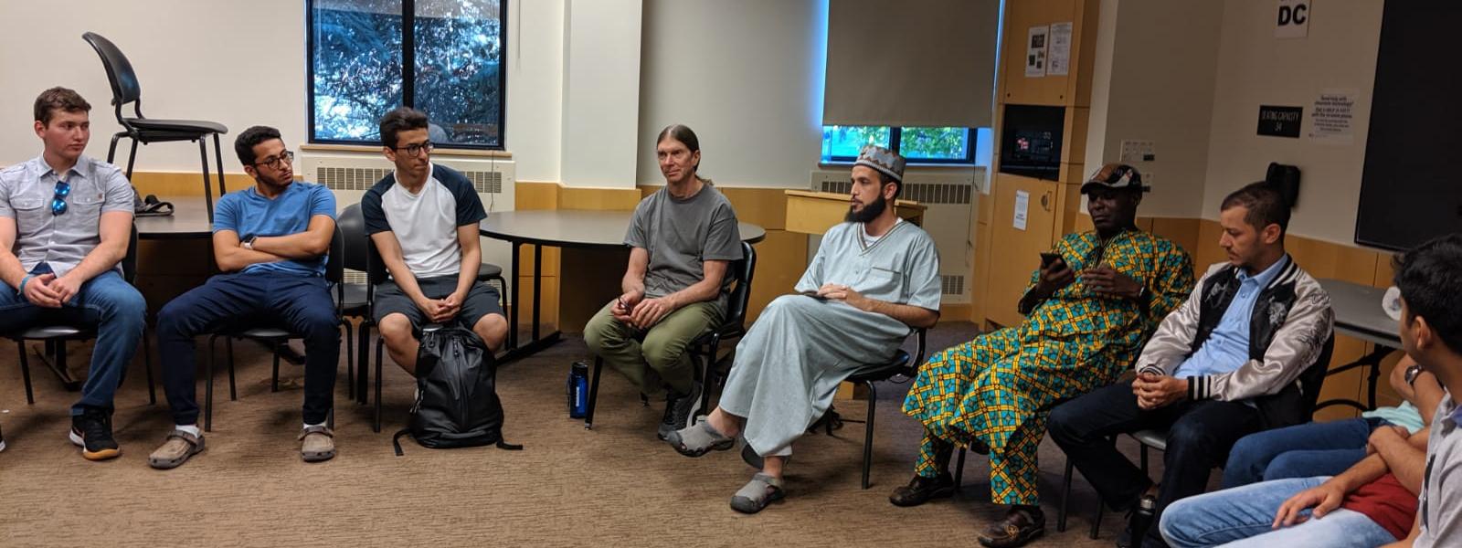 Sheikh Shuab having a discussion with students