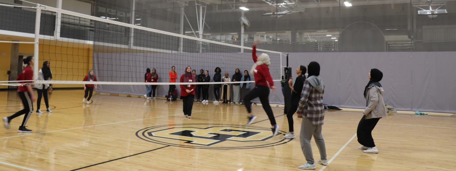 Muslims playing volleyball