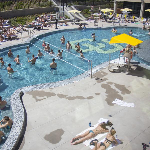 Student swim in the Buff Pool on campus