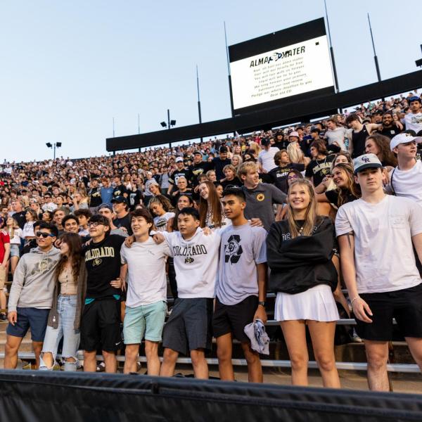 Students in Folsom Field for Kickoff