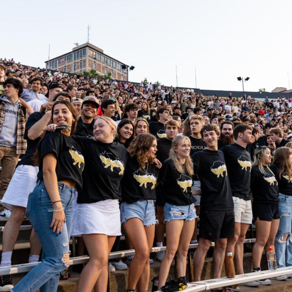 Students in Folsom Field for Kickoff