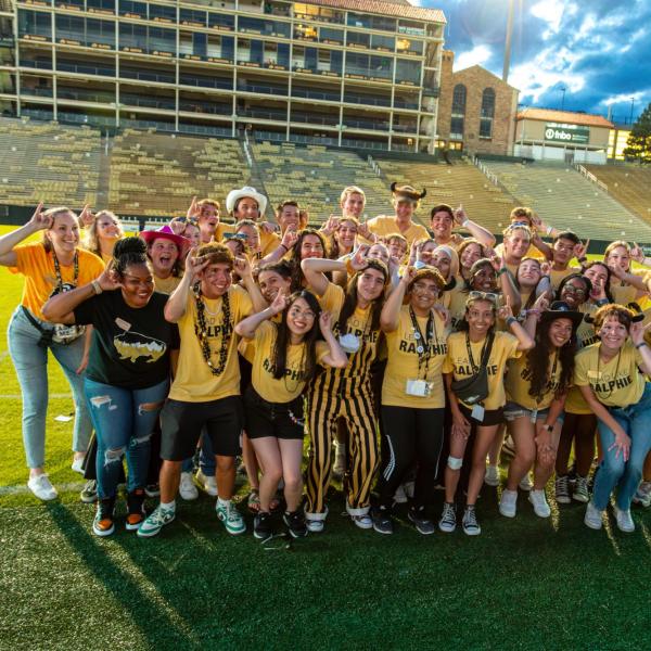 students on Folsom Field for kickoff