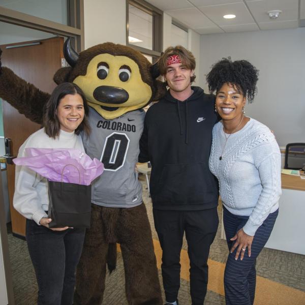 Chip visits Student Affairs staff to hand out gift bags and pose for pictures during Random Acts of Kindness Week