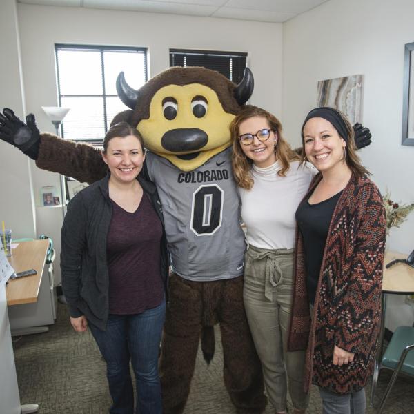 Chip visits Career Services staff to hand out gift bags and pose for pictures during Random Acts of Kindness Week