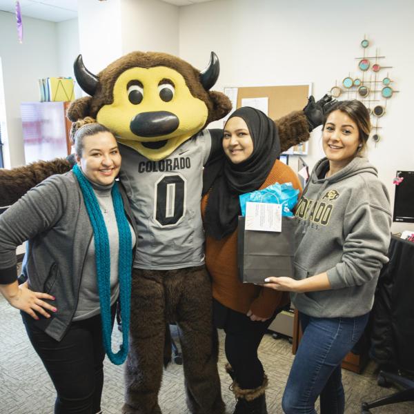 Chip visits Student Affairs Human Resources staff to hand out gift bags and pose for pictures during Random Acts of Kindness Week